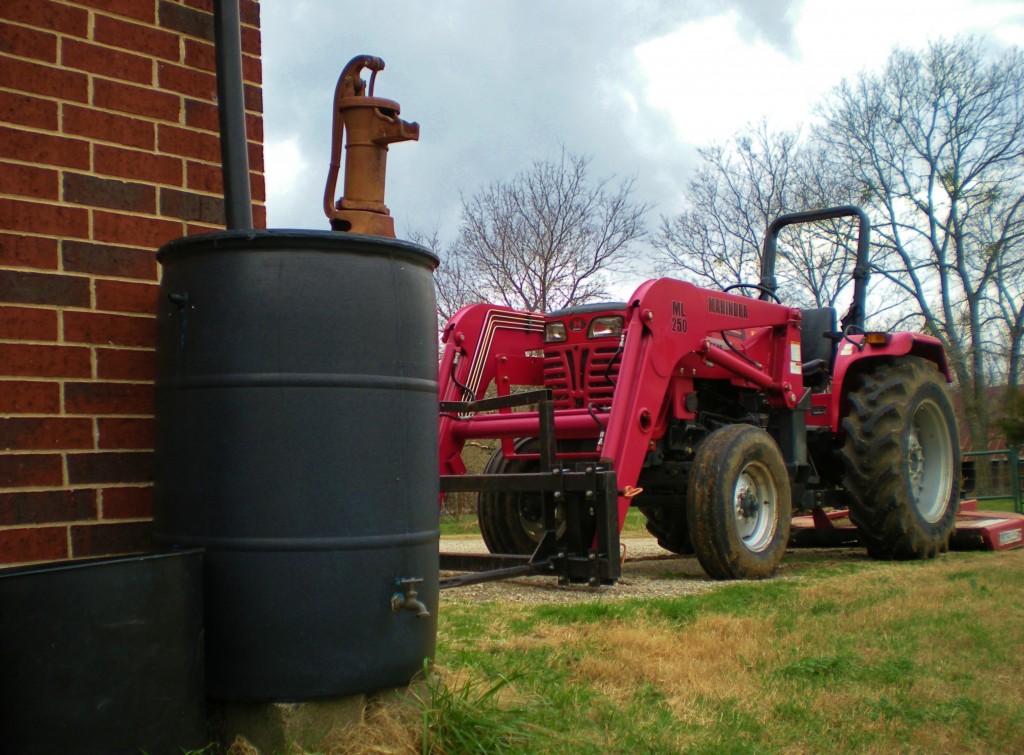 Rain barrel for rainwater collection. It's Earth Day EVERY day! I'm sharing this post about outside water conservation & rain water. How do you conserve water outdoors? #TexasHomesteader