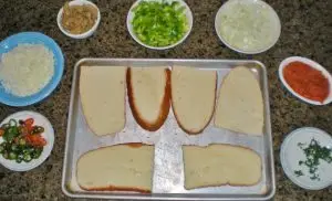 To keep food waste down I often use stale french bread to make some amazing french-bread pizzas. No need to mix up pizza dough. Pizza Nite is Quick & Easy! #TexasHomesteader