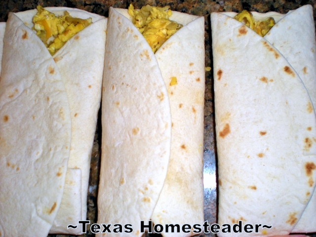 Homemade Convenience Food! I made breakfast burritos for the freezer so I could make sure none of our pastured eggs go to waste. #TexasHomesteader