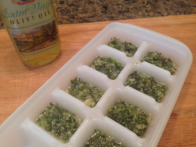 'HERB BOMBS' made from minced herbs and olive oil makes it easy to have your own convenient flavoring right in your own freezer! #TexasHomesteader