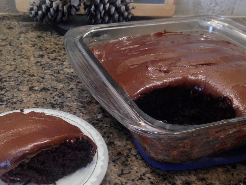 An unfrosted chocolate crazy cake uses no eggs, milk or butter. #TexasHomesteader