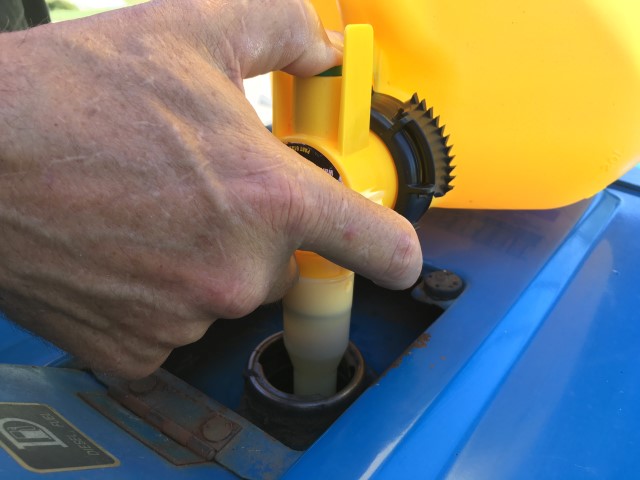 Hard as he may try, RancherMan would always splash fuel when filling my tractor's tank. Let's try this No-Spill can & see how it works! #TexasHomesteader