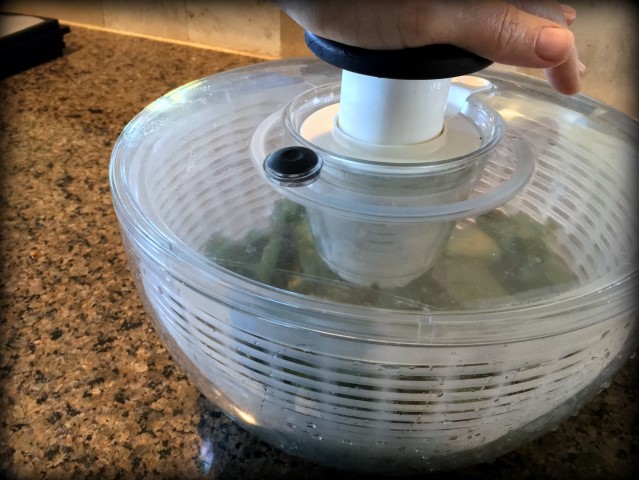 Salad spinner before dehydrating. Dark-green heart-shaped leaves that grow in a vine even in the Texas summer heat. Beauty, edibility and heat-loving staying power. #TexasHomesteader