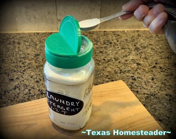 Homemade laundry detergent. I place a repurposed parmesan cheese lid on a standard 1/2-pint canning jar. See how it simplifies my life in the kitchen. #TexasHomesteader