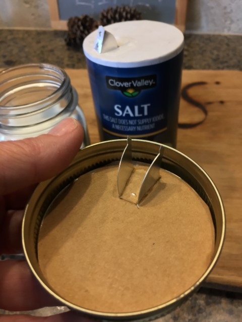 Cut top of salt container, insert into canning ring. Then screw into canning jar to use the pouring spout to make a convenient pourable sugar jar! #TexasHomesteader