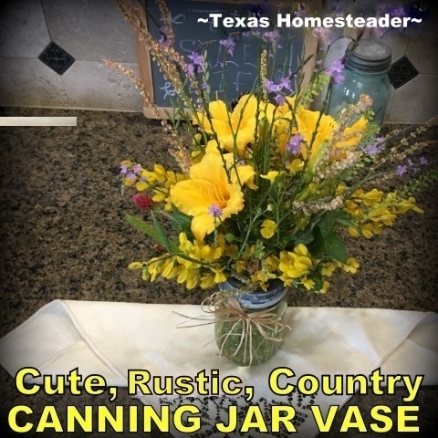 Cute rustic country canning jar vase with raffia bow and zinc lid. #TexasHomesteader