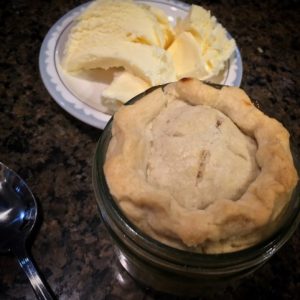 Single-Serving Apple Pies baked in individual wide-mouth canning jars. They were delicious and oh-so-cute! #TexasHomesteader