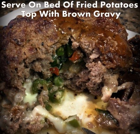 Poor-Man's Steak - a thick serving of ground meat stuffed with grilled onions & peppers along with melted cheese. It's often served on top of fried potatoes & topped with brown gravy. #TexasHomesteader