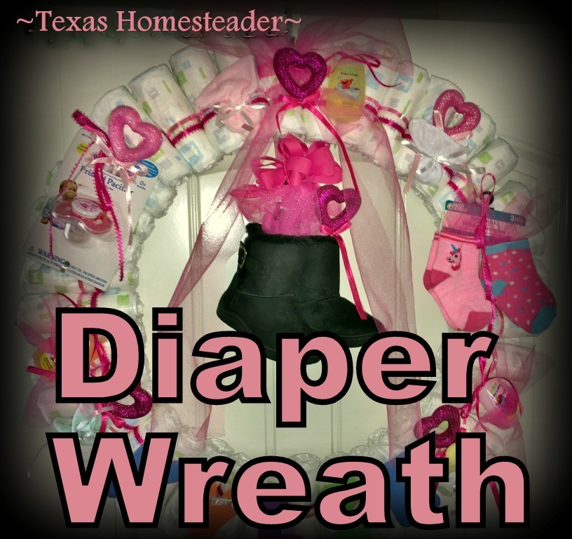 Cute Diaper Wreath Gift For Baby. This gift didn't cost much money but it was hand-made with much love. Items can be pulled from the wreath as needed. #TexasHomesteader