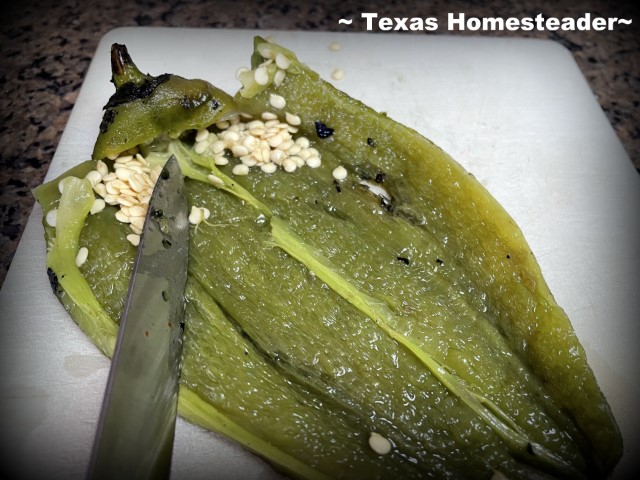 Split open pepper and scrape away seeds. #TexasHomesteader