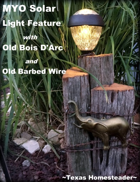 Solar light feature using old, aged Bois D'Arc wood and rustic old 1880's barbed wire, a metal elephant embellishment and decorative solar light. Perfect! #TexasHomesteader