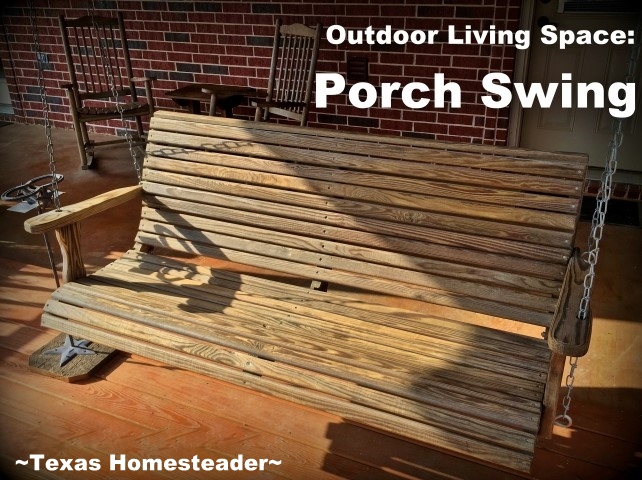 Adding a porch swing. We wanted an outdoor living space added to our back porch. Come see some of the things we added to make it our own little oasis. #TexasHomesteader