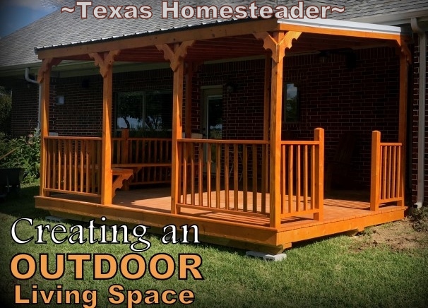 Outdoor living space expanded with wooden porch addition. #TexasHomesteader