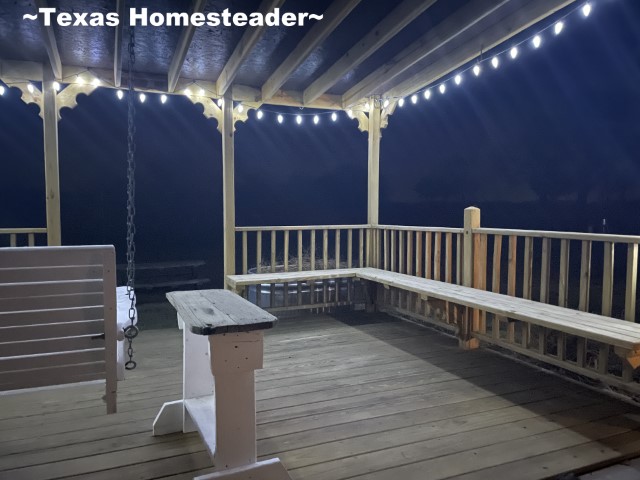 Small back porch lights at night in outdoor living area to relax. #TexasHomesteader