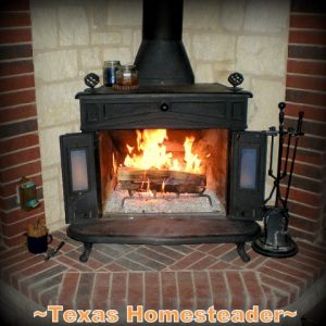 Franklin fireplace and warming fire. Come see 5 frugal things we did at our homestead to save the environment and some cold hard cash too during this self isolation period. #TexasHomesteader