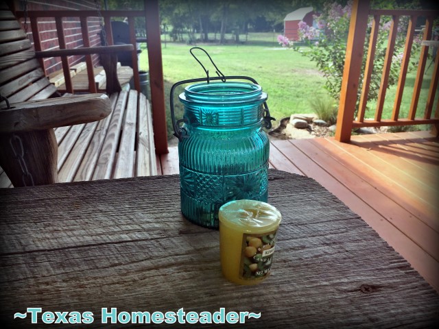 I used an old broken flip-top jar, some gravel and a small votive candle to make the cutest porch lantern ever. Come see! #TexasHomesteader