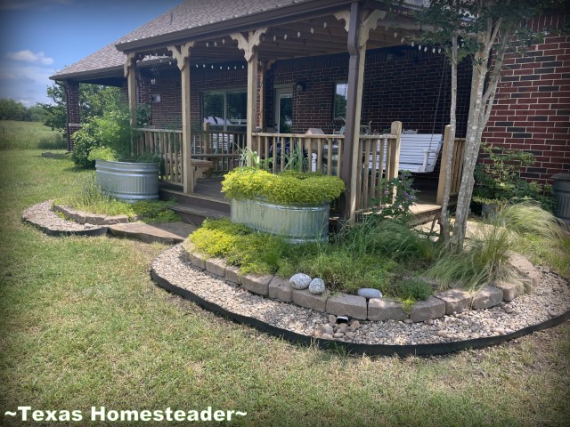 Porch extension landscape bed with grass barrier, concrete and gravel. #TexasHomesteader