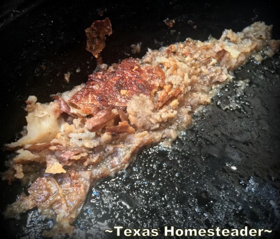 Stuck-on food frustrating you while cleaning your cast-iron skillet? I've found an EASY way to get it clean. Check out my lazy-cook's method! #TexasHomesteader