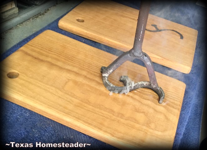 Branding the homemade cutting boards. How to make your own oak cutting board. We presented these cheeseboards with our homemade cheeses as a very personal homemade gift. #TexasHomesteader