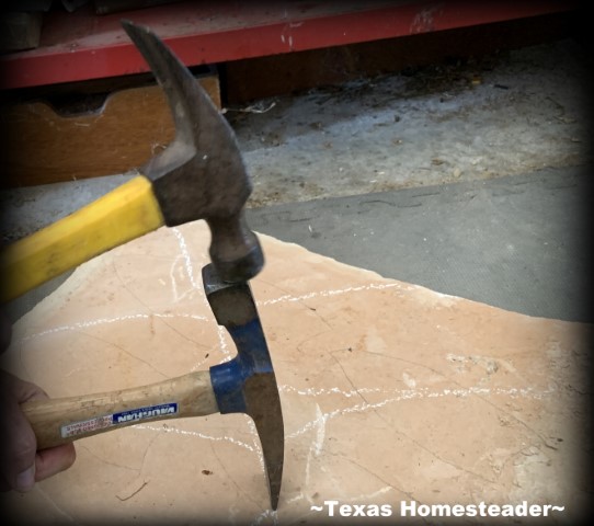 Cutting rock with rock hammer and claw hammer for dragonfly rock art. #TexasHomesteader