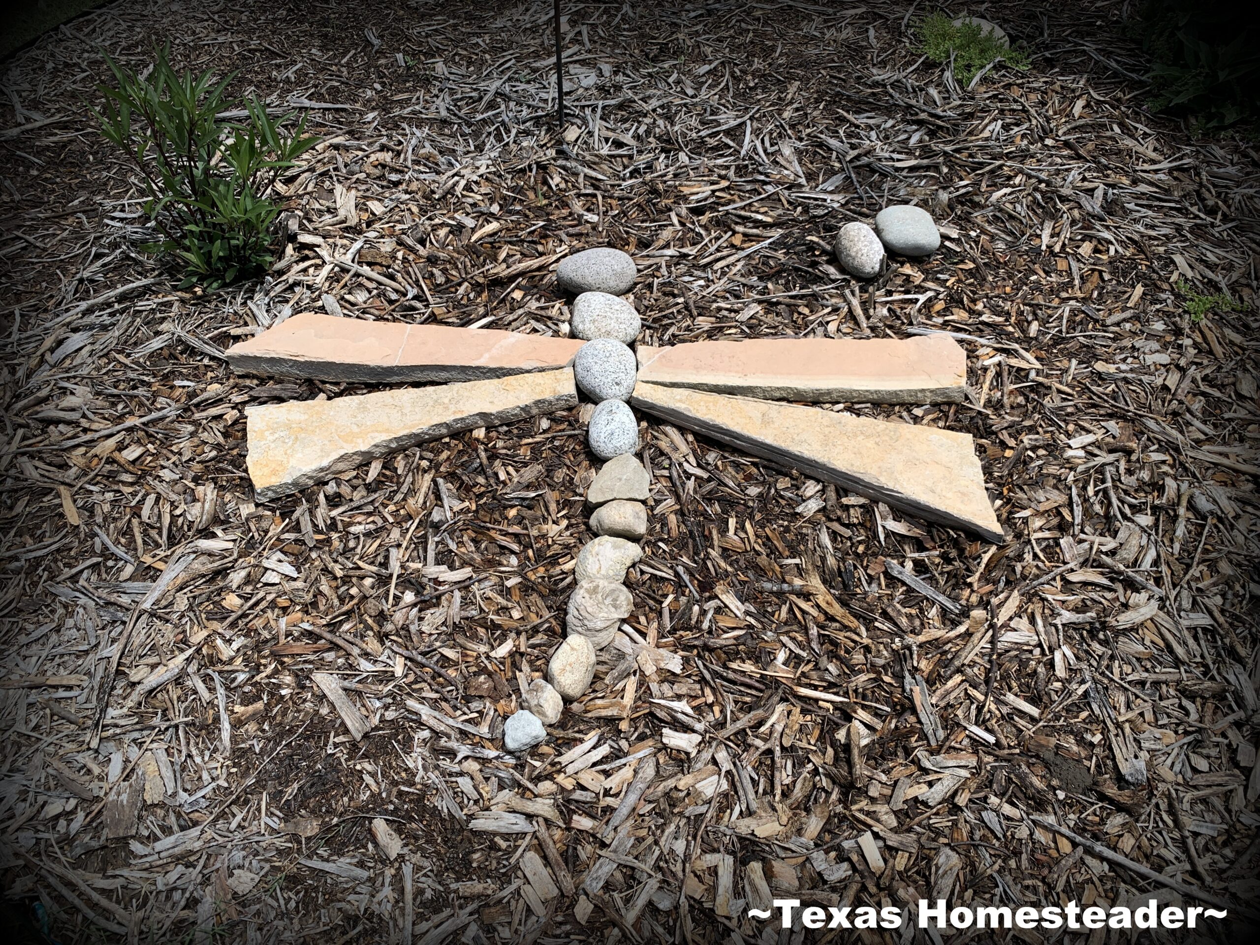 Dragonfly rock art feature made from various rocks placed in our Northeast Texas garden. #TexasHomesteader