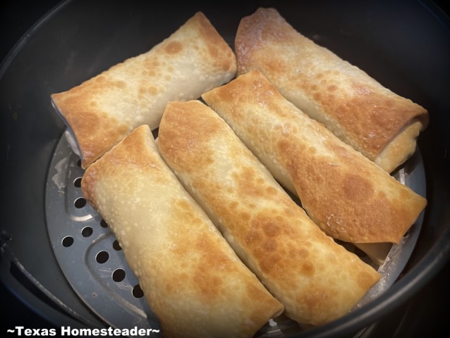 Southwest Egg Rolls crisping in an air fryer. #TexasHomesteader