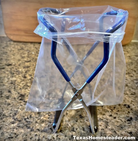 I use a canning jar lifter to hold open a zippered freezer bag for a no-mess way to fill with food. #TexasHomesteader